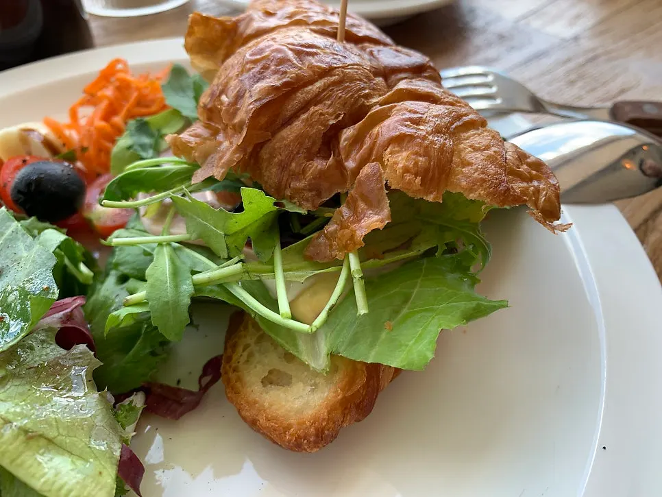 Plated croissant sandwich