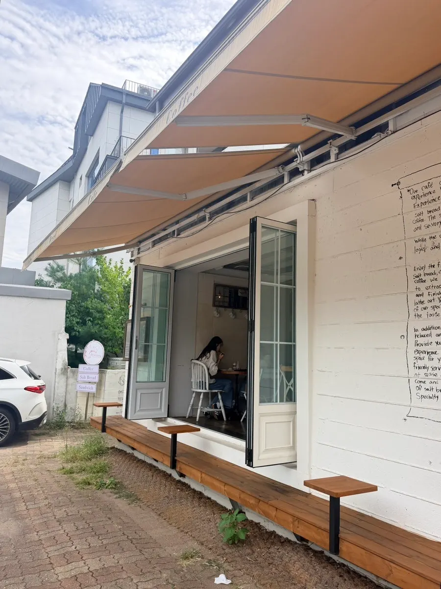 Interior of Respire Bakery Cafe Seochon with windows open