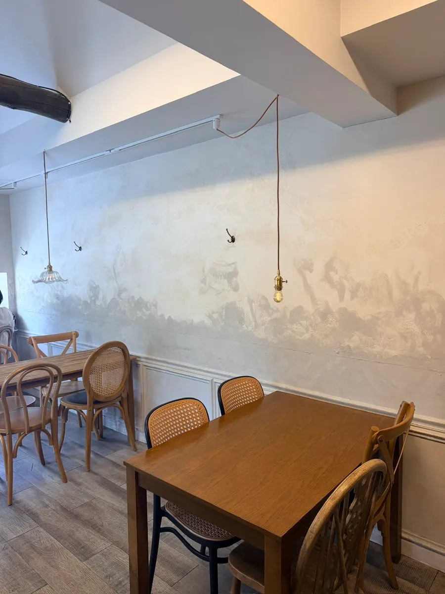 View of the second-floor seating at Respire Bakery Cafe Seochon