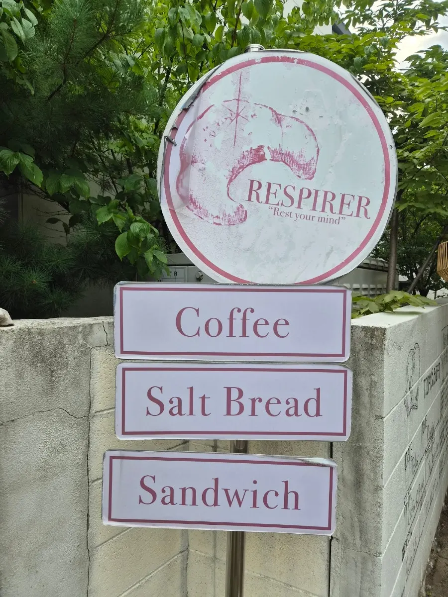 Exterior of Respire Bakery Cafe Seochon bustling with customers at 4pm