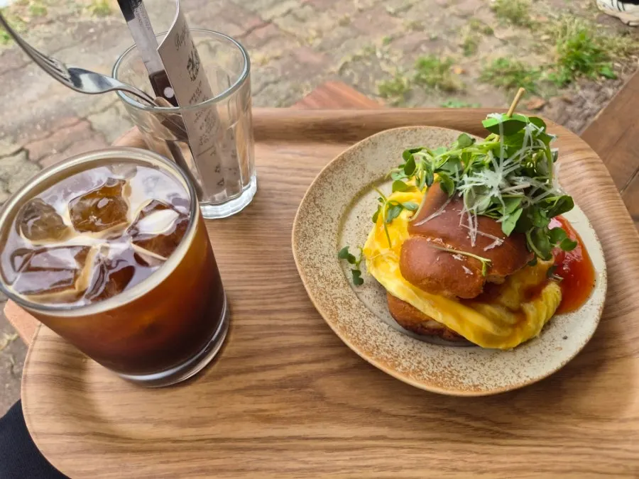 The ordered shrimp sandwich served on the table