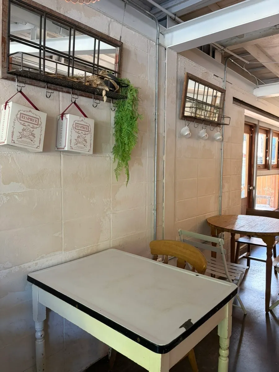 Second-floor seating in a white and wood mood