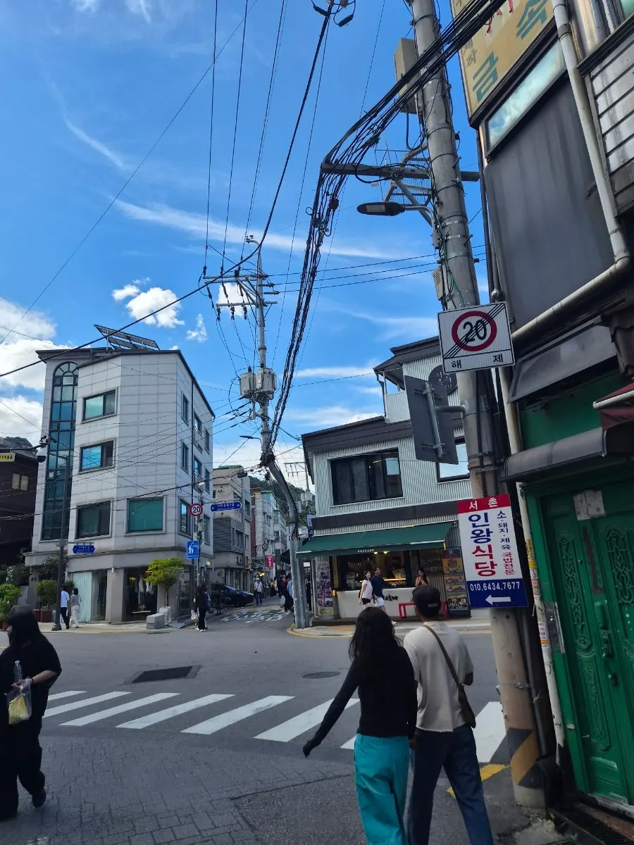 A Seochon street near the Gyeongbokgung stone wall path