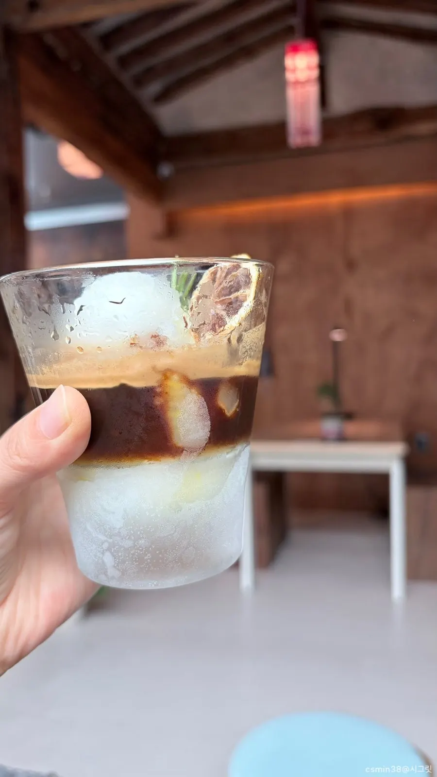 A cup of lemon sorbet on the table