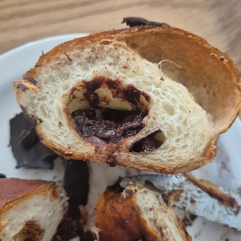 Chocolate salt bread topped with pistachios