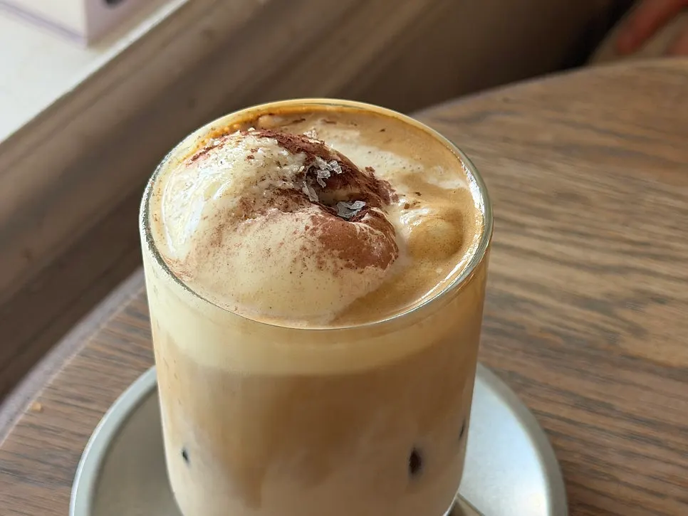 Salt summer latte topped with vanilla ice cream and salt