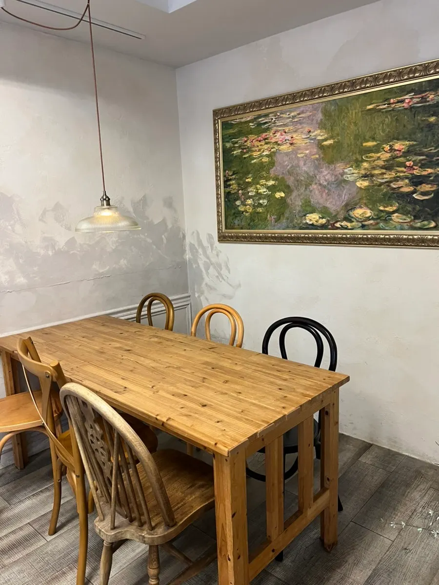 Tables on the second floor of Respire Bakery