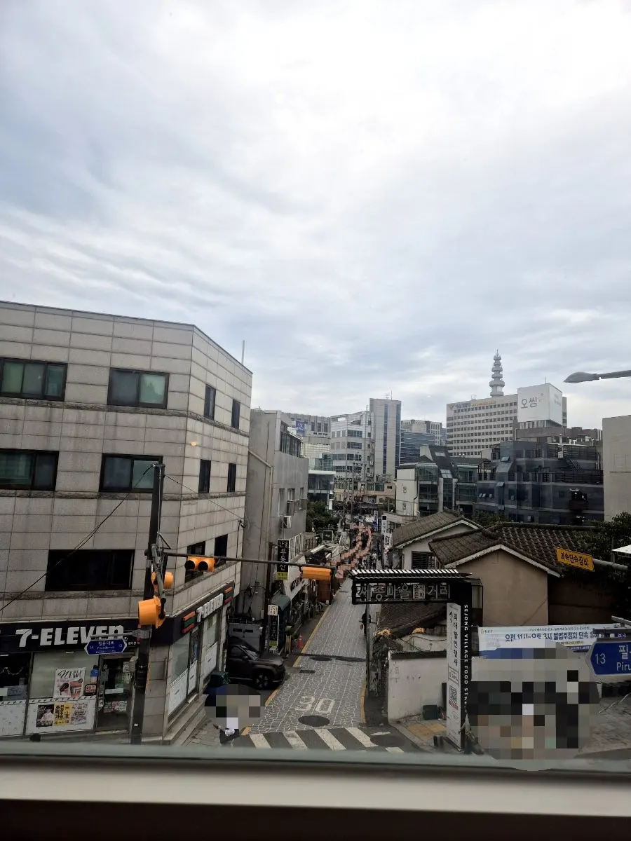 Floor-to-ceiling windows overlooking Seochon