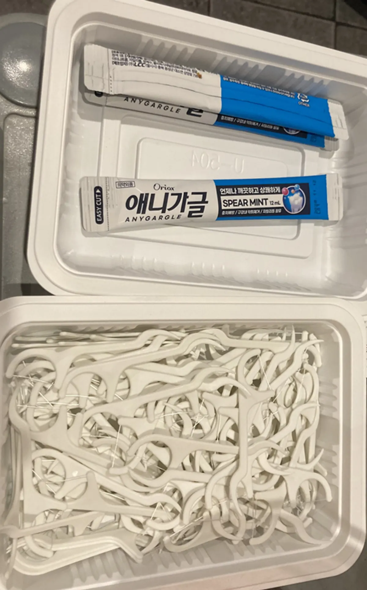 Mouthwash and disposable dental floss provided at the restaurant
