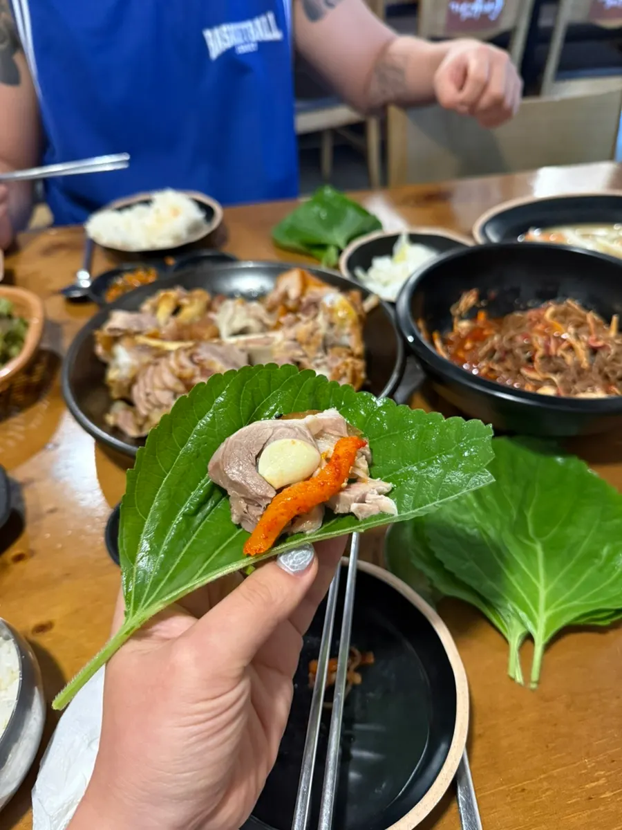 Jokbal wrapped in lettuce and perilla leaf