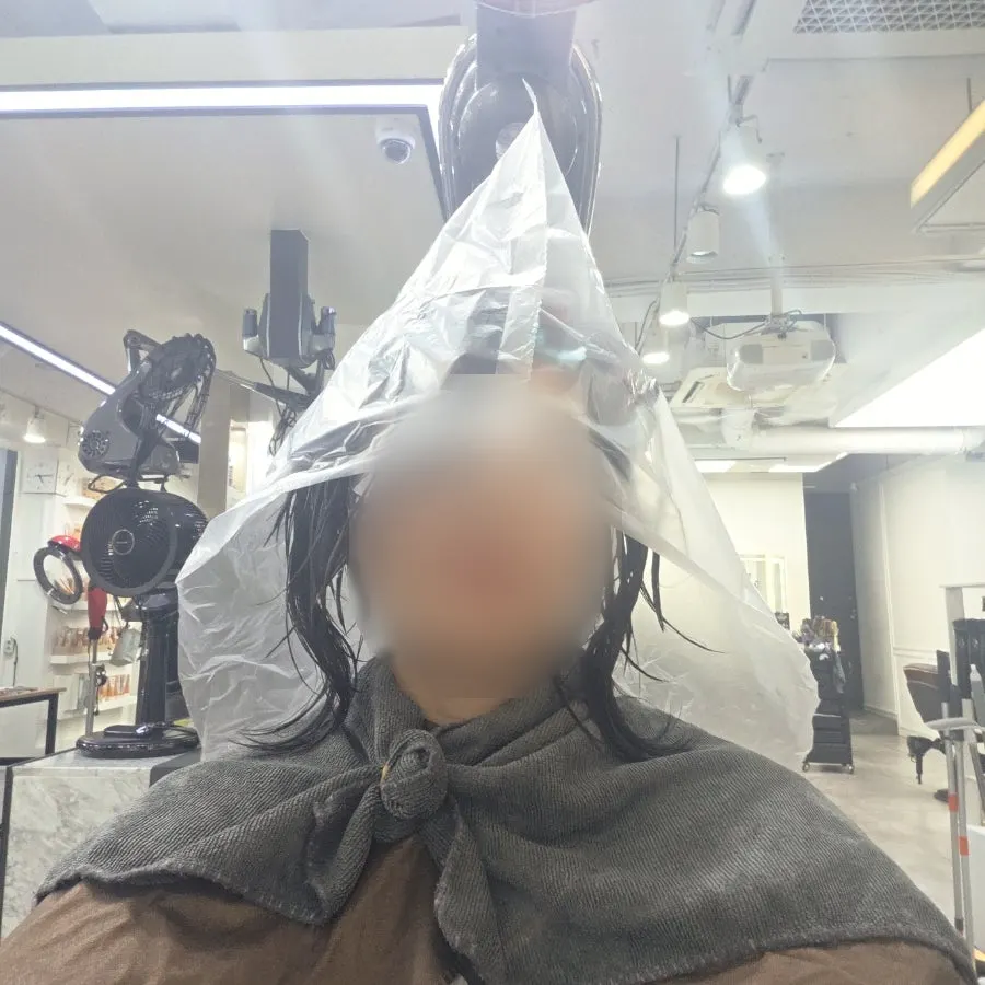 Applying pre-treatment product to the hair