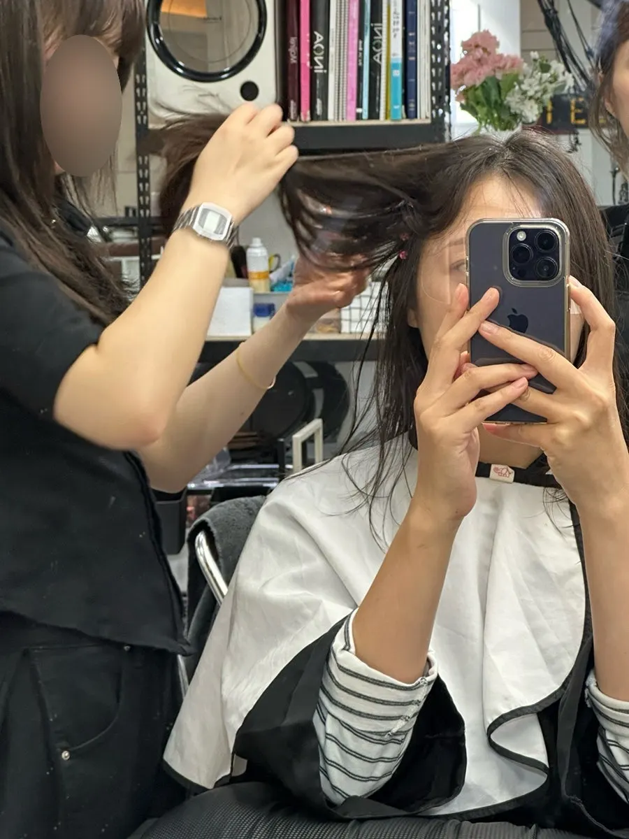 Waiting while the perm process is explained