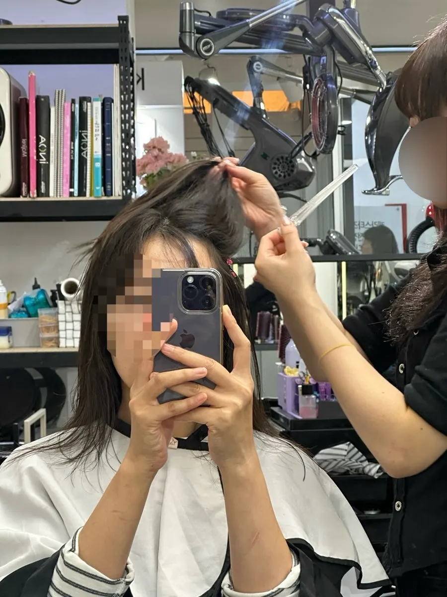 Mid-process during the perm at Salon de Supullim