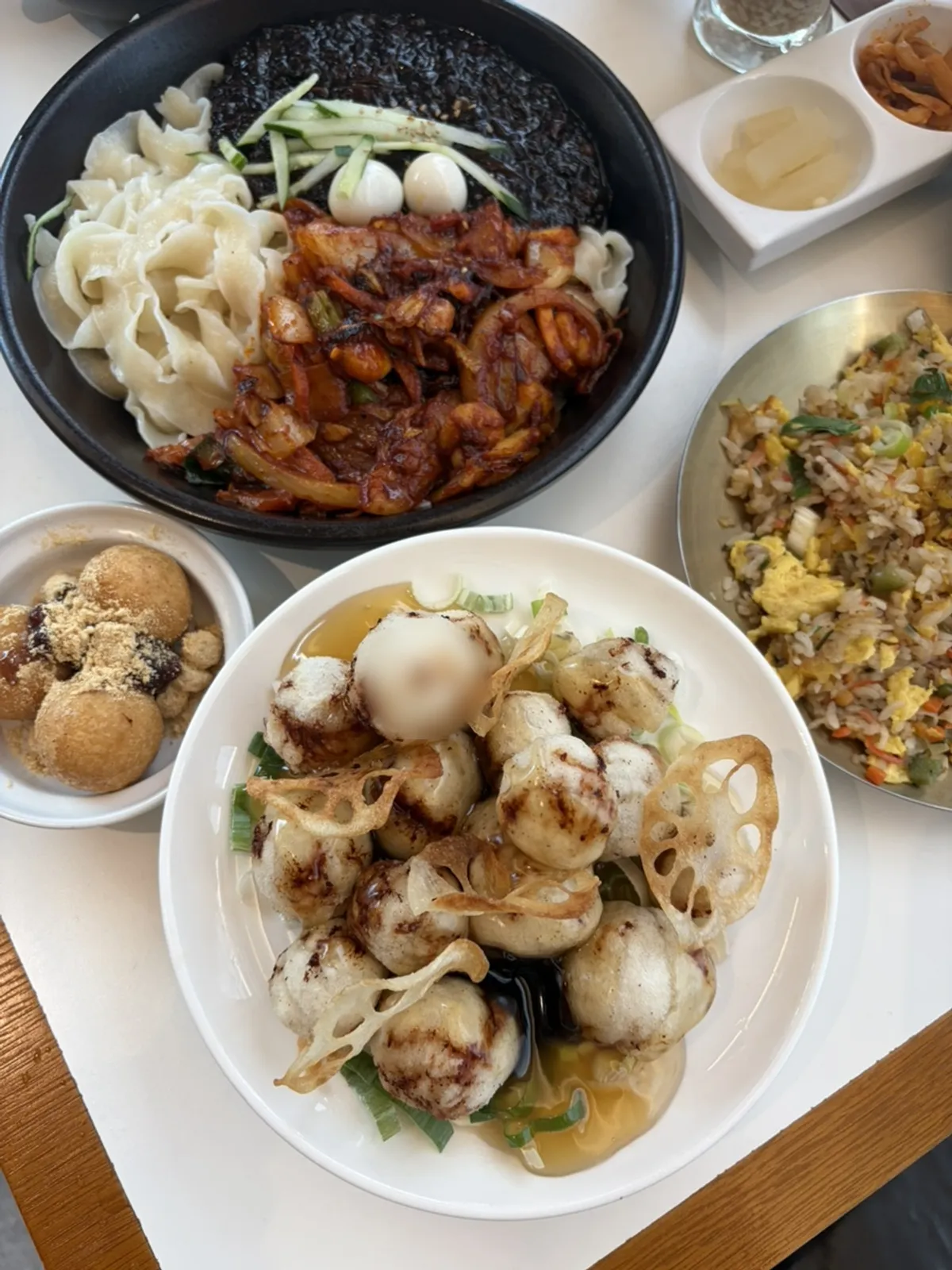 Dosakmyeon noodle dish and tangsuyuk table setting at Seodamheon Hongdae