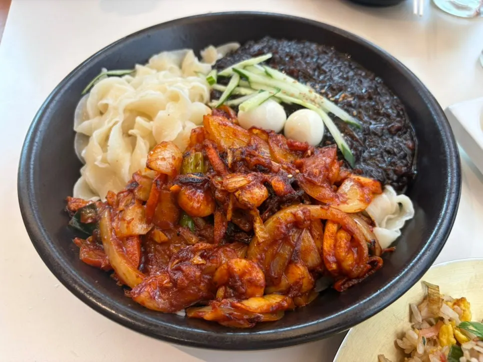 Signature samjjamyeon with jjajang and charcoal-grilled jjamppong together