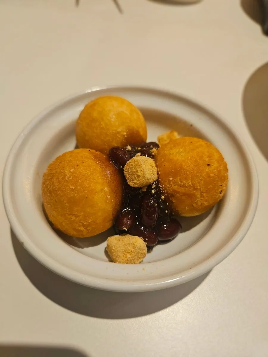 Sweet rice donuts and red bean served as dessert in the set