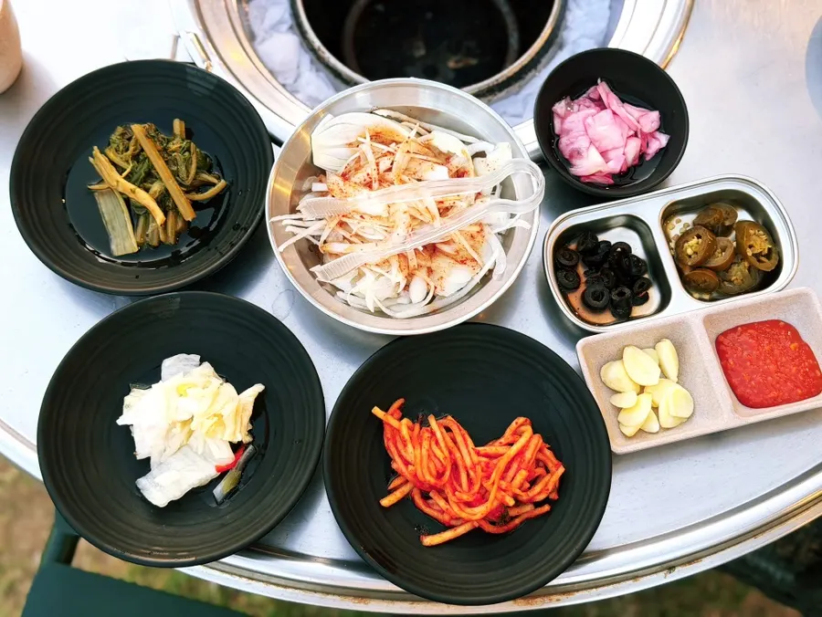 Basic table setting for a black pork meal