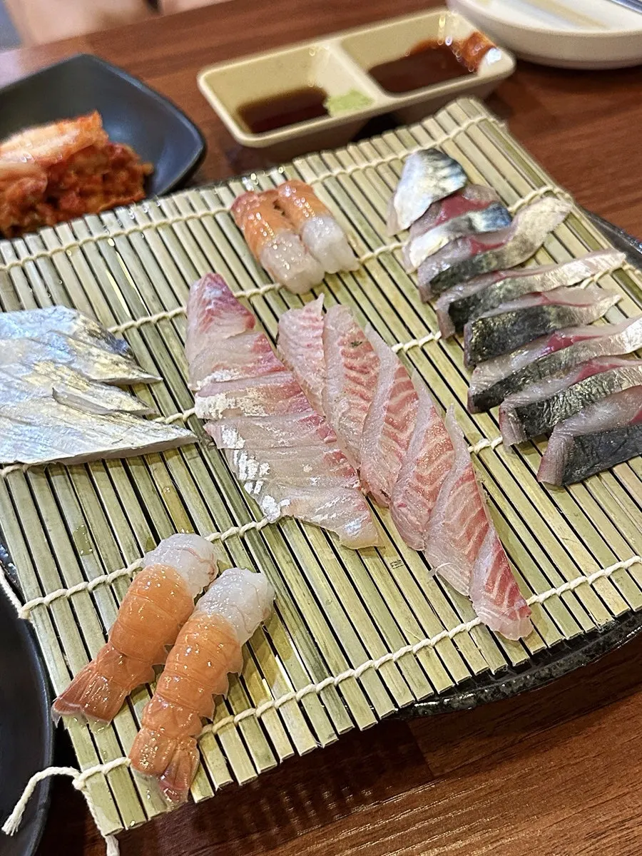 A plate of fresh sashimi kept in the restaurant's own fish tank