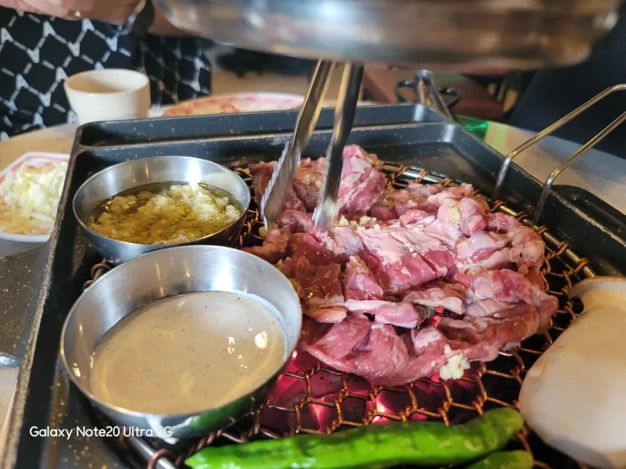 Doldol manongsal dorándose en la parrilla