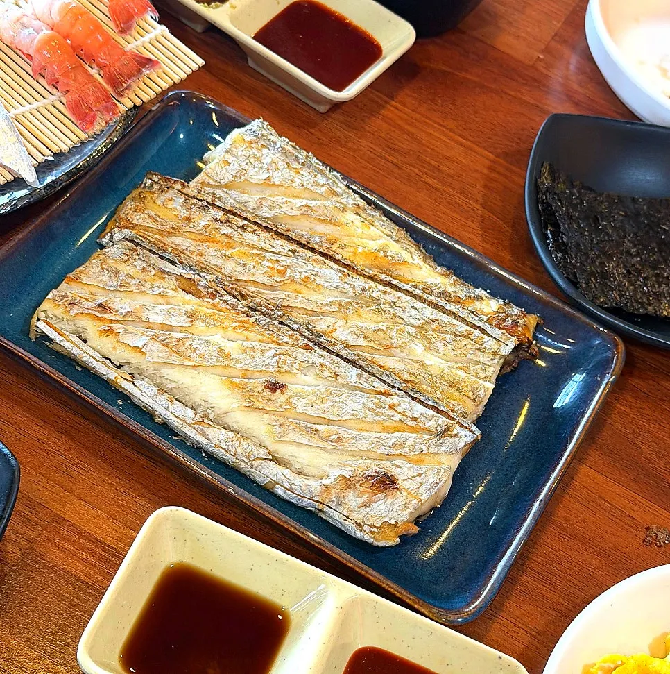 Golden-brown grilled Jeju cutlassfish