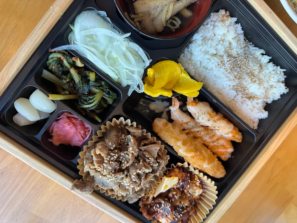 House-made yeolmu kimchi and pickled radish side dishes