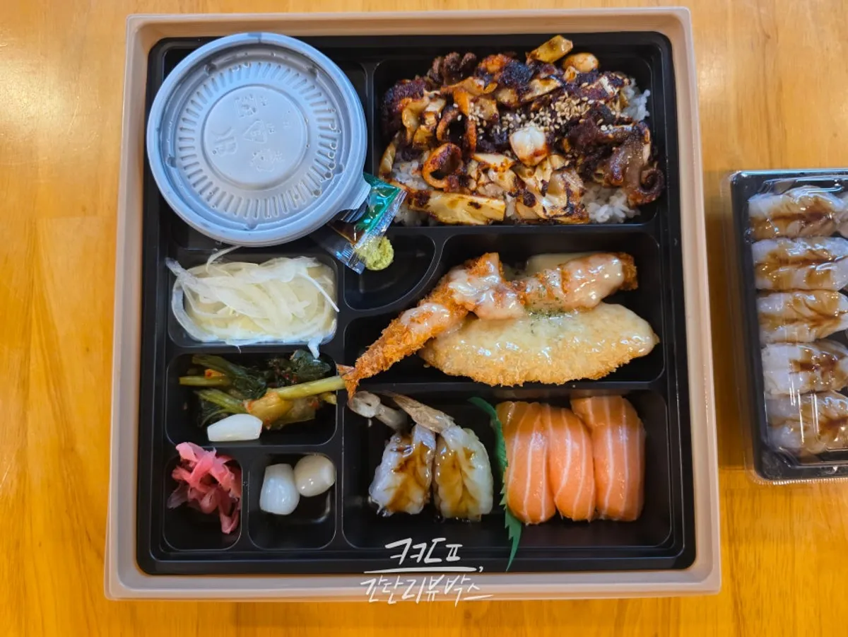 Three side dishes with onion slices and a soup container