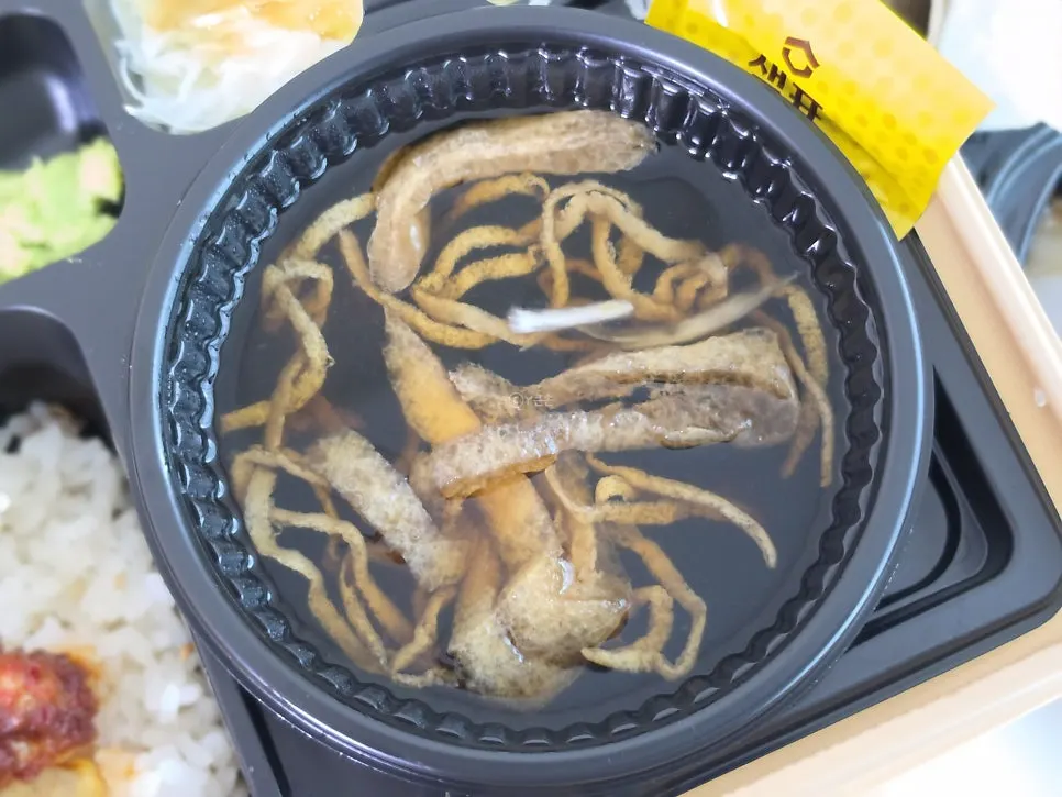 Cross-section of shrimp tempura showing plump shrimp