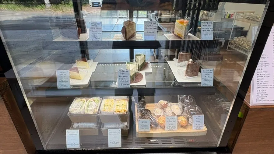 Menu board listing desserts and bakery items