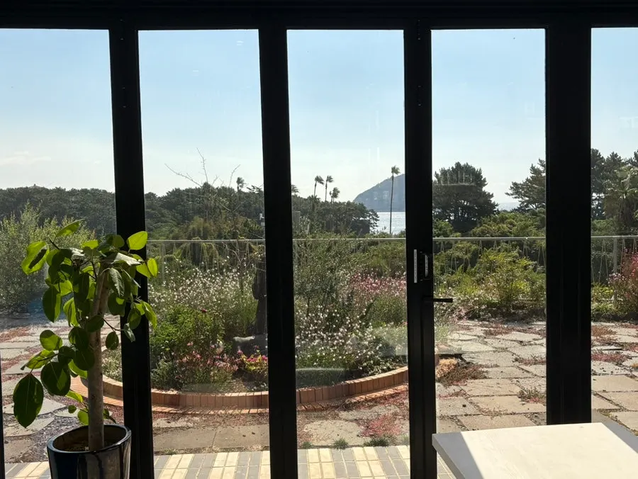1st floor seat with ocean view through floor-to-ceiling windows