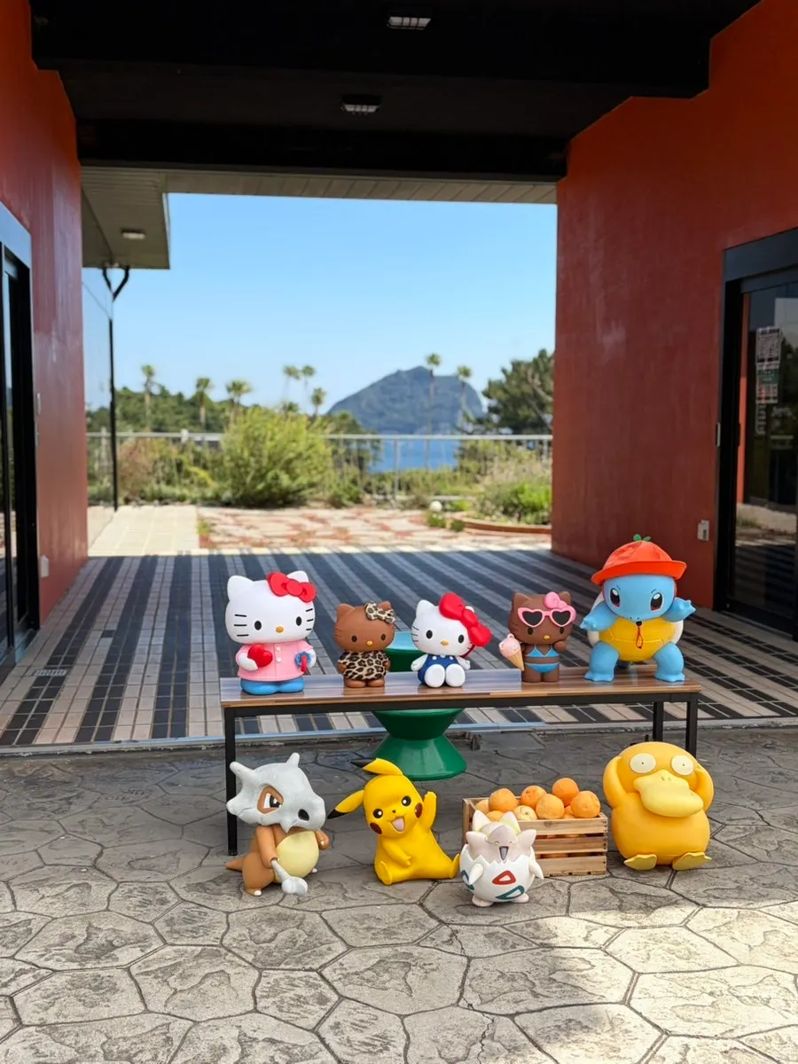 Café entrance with character dolls