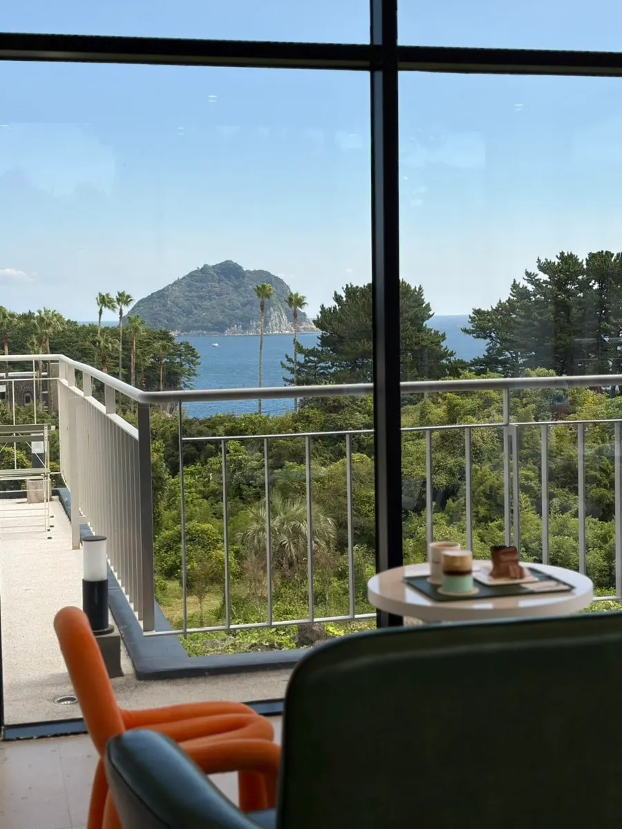 Second-floor interior with views of the sea and forest