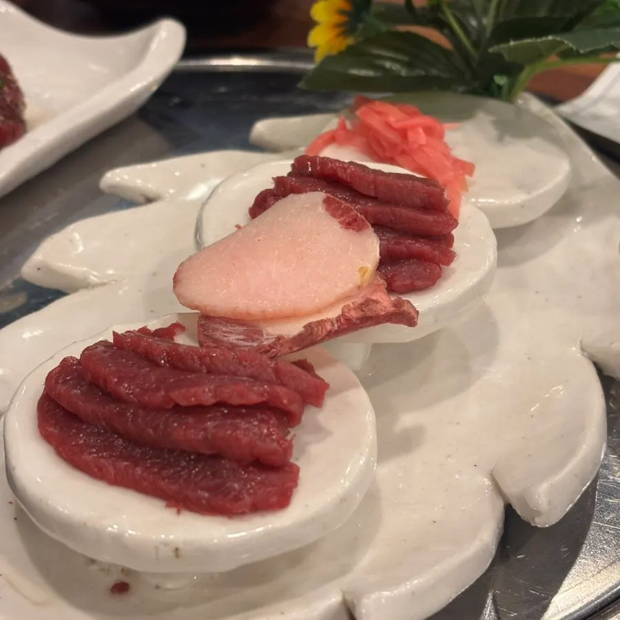 잔에 담긴 말고기 엑기스
