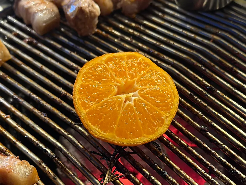 Tangerines grilling on the grill