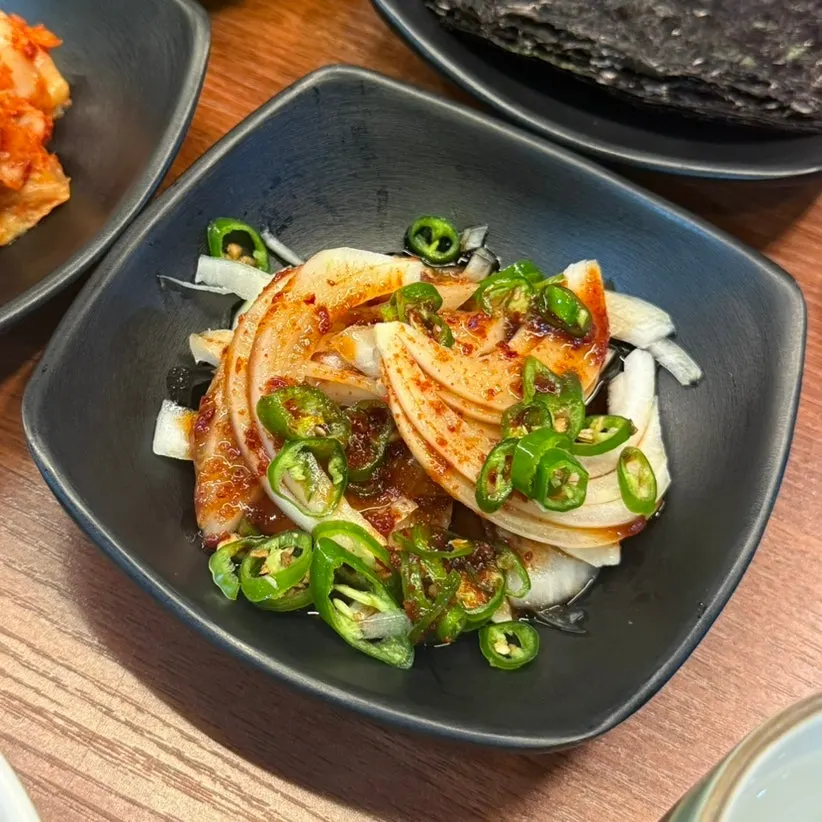 Table with wasabi soy sauce and chojang sauce