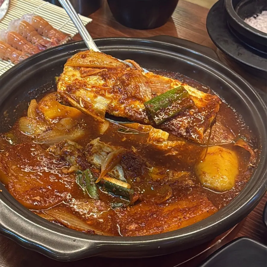 Spicy braised cutlassfish with radish and potato