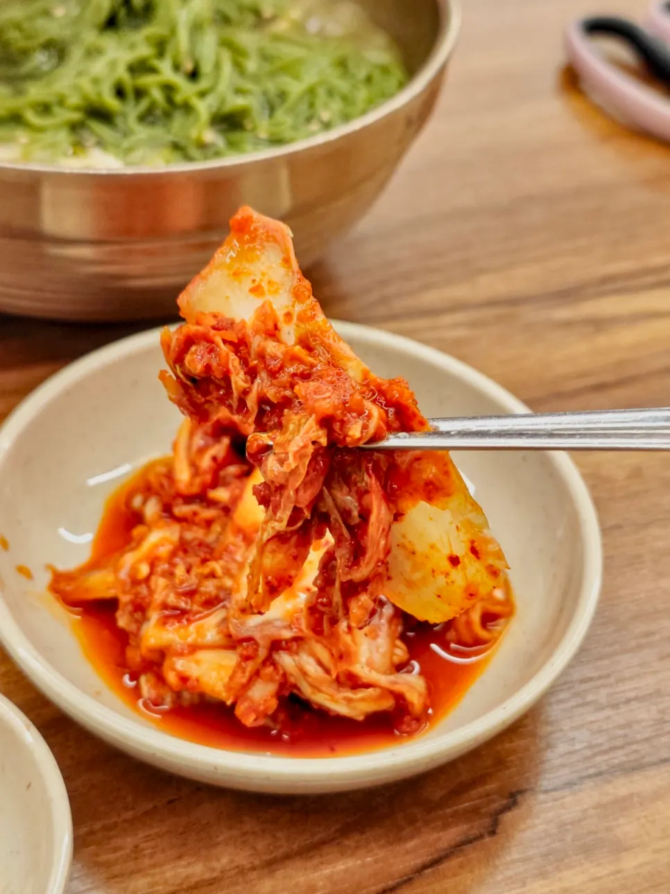 Kalguksu served with garlic salad on the side