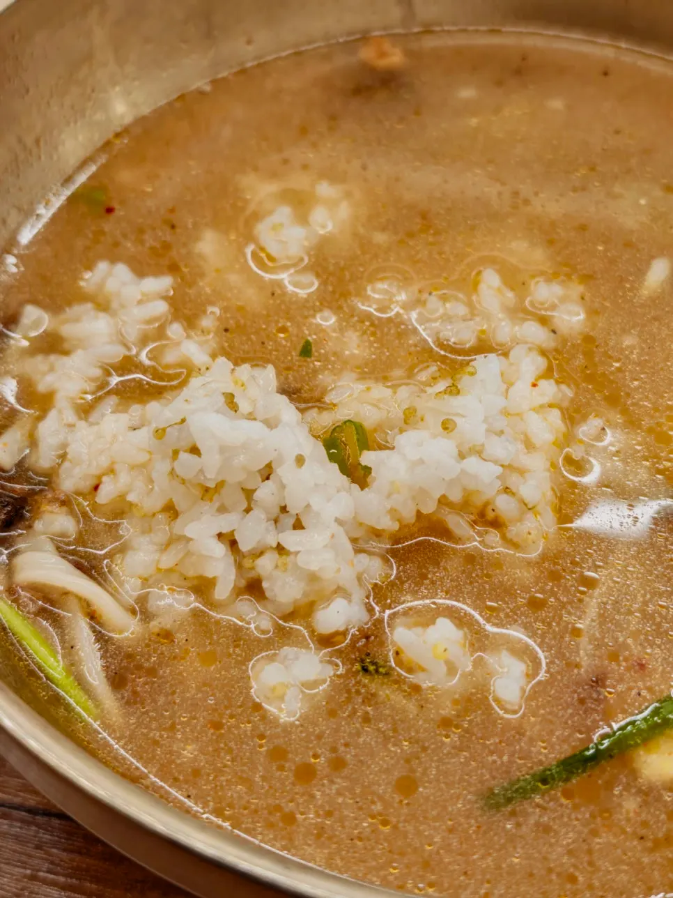 A bowl of rice mixed into the kalguksu broth