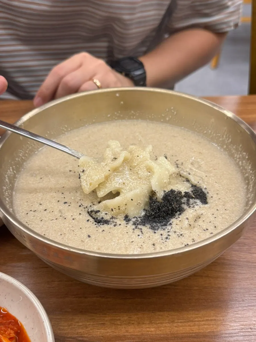 Close-up of the thick perilla broth in the sujebi