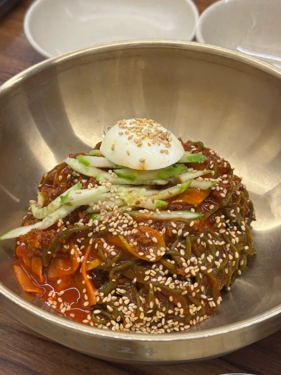 Dakgaejang, bibim guksu, and gyoja mandu combination