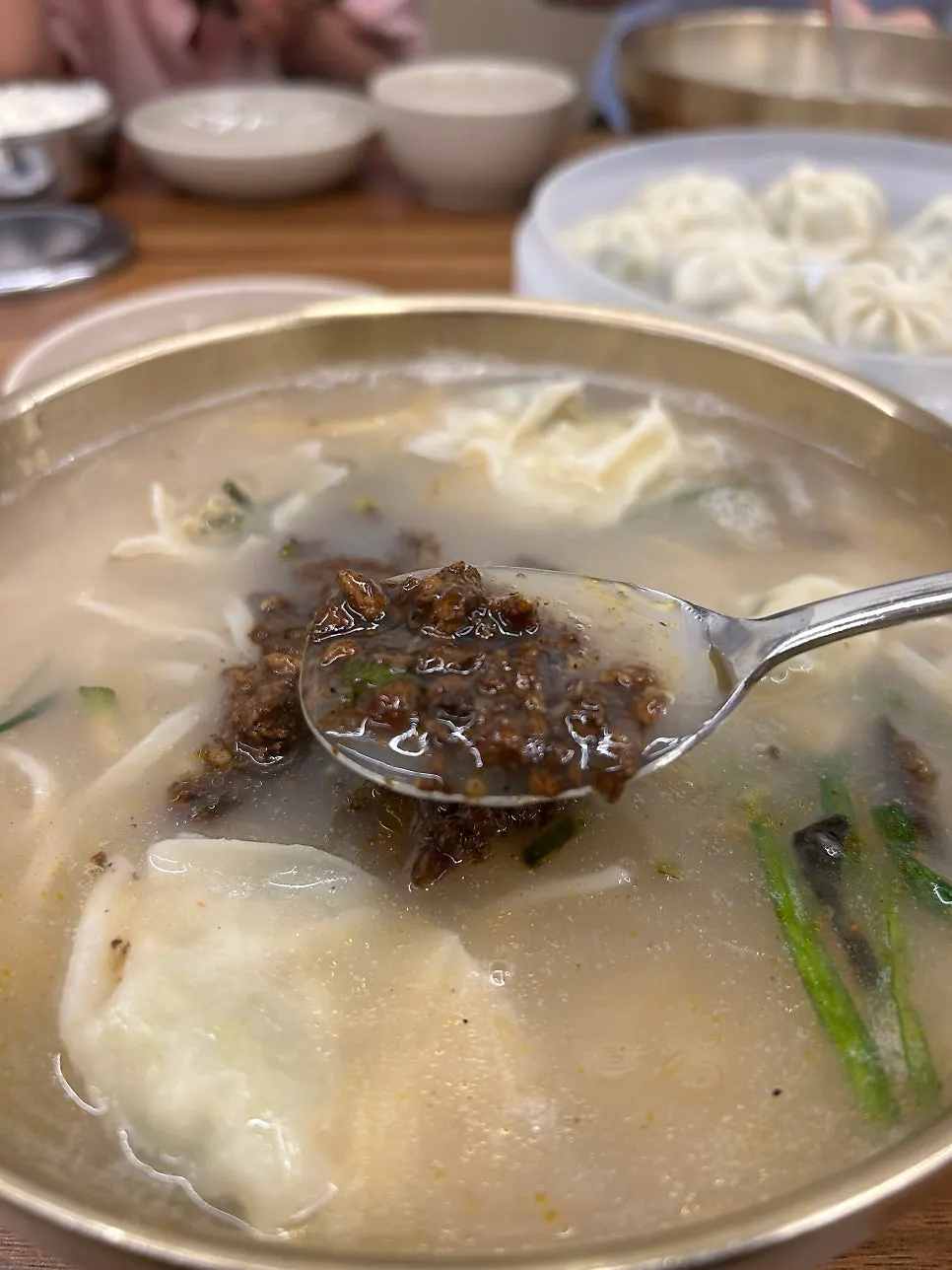 Kalguksu with meat topping and dumplings