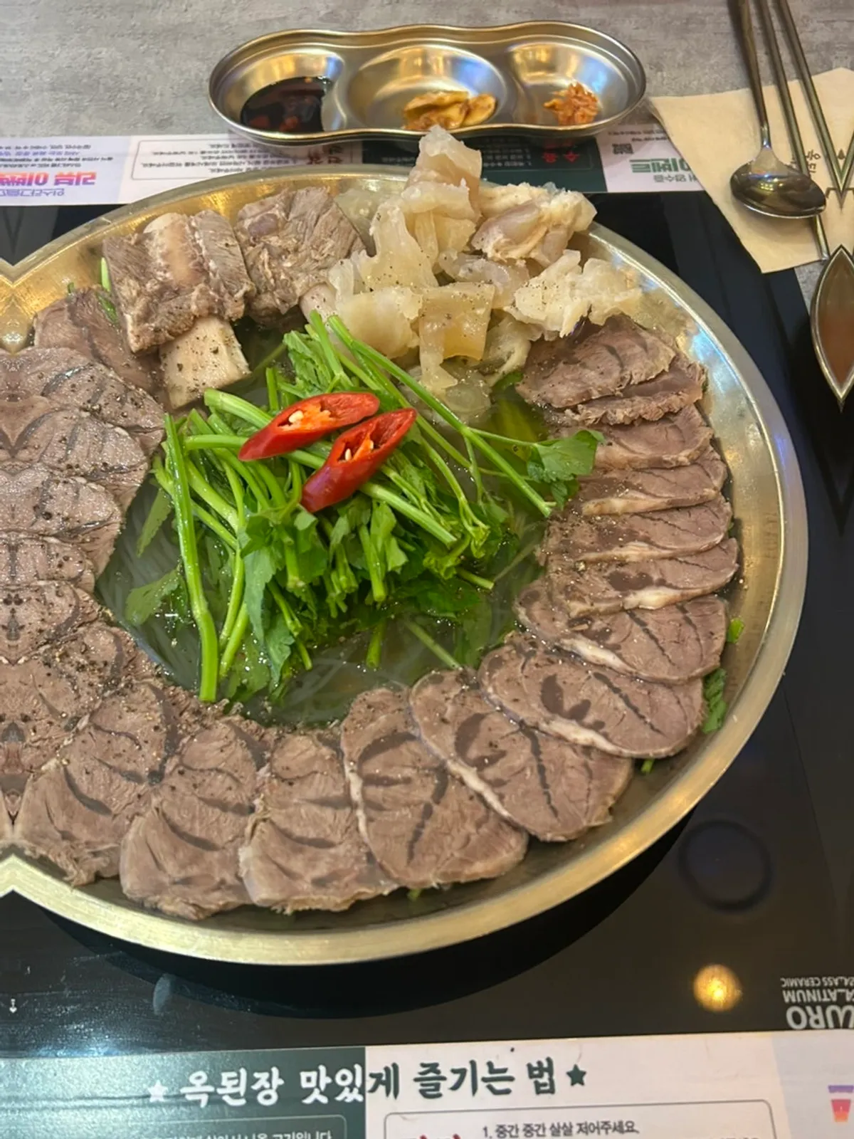 Boiled pork hot pot with a mix of different cuts