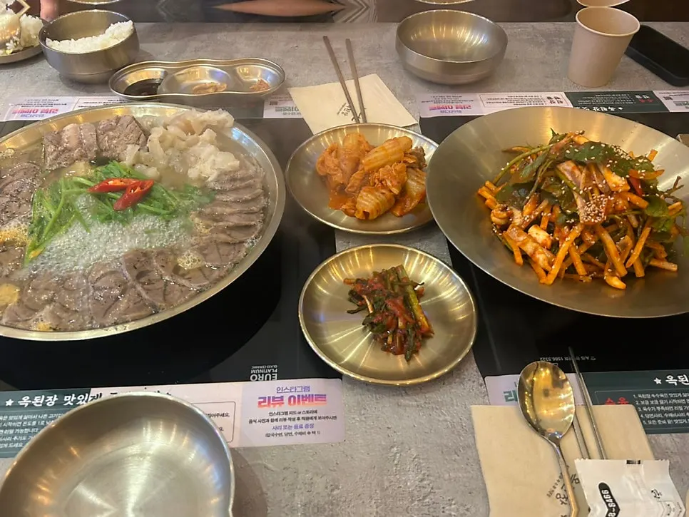 Korean meal spread with yeolmu kimchi and napa cabbage kimchi