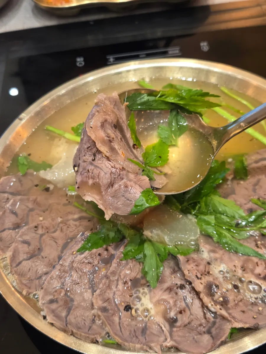 Assorted boiled pork hot pot with pork and beef tendon