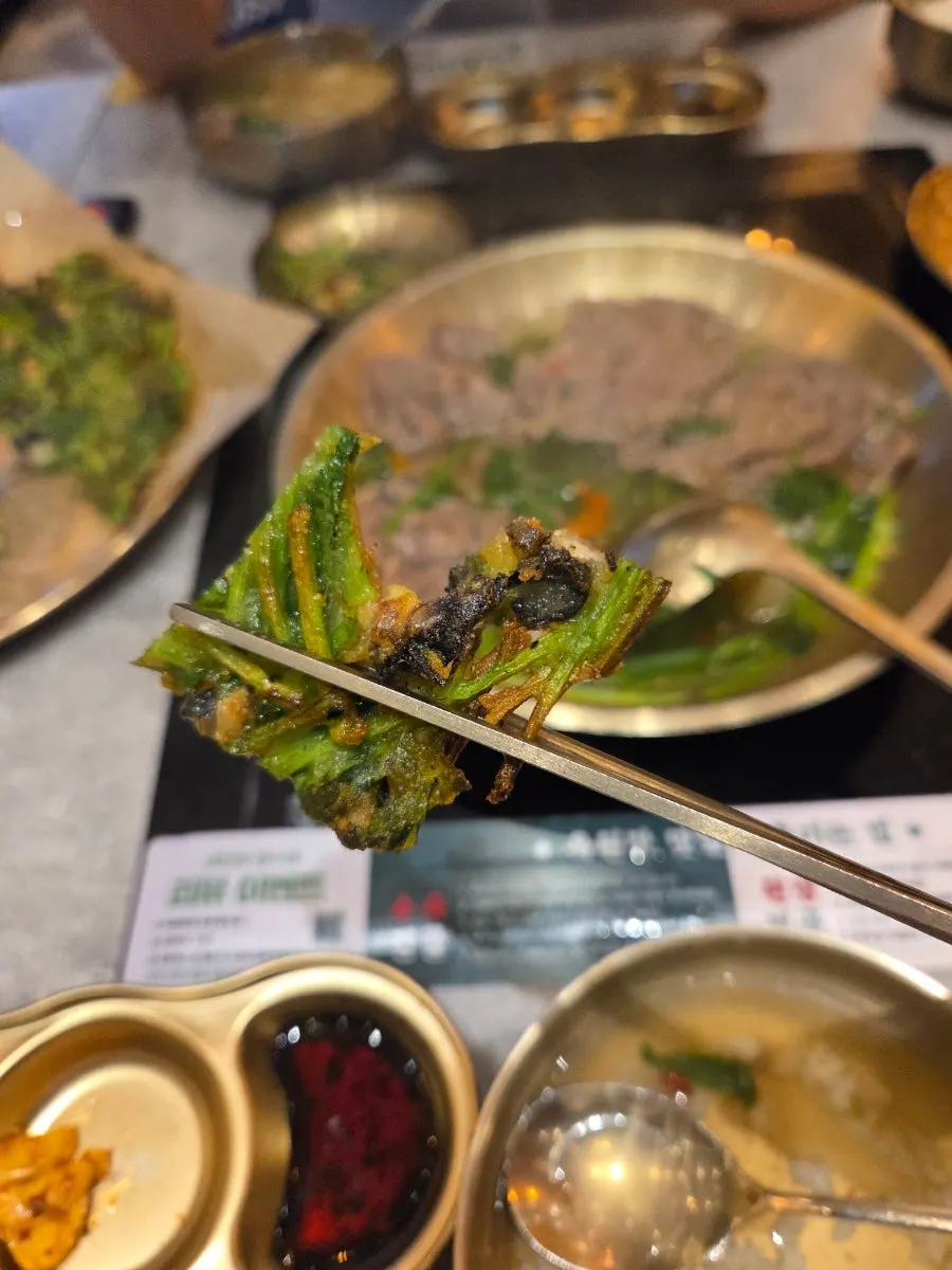Plate of minari-snail pancake full of minari