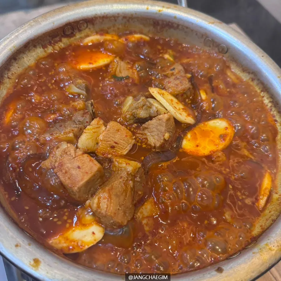 Pot of mild pork galbijjim for two set on the table