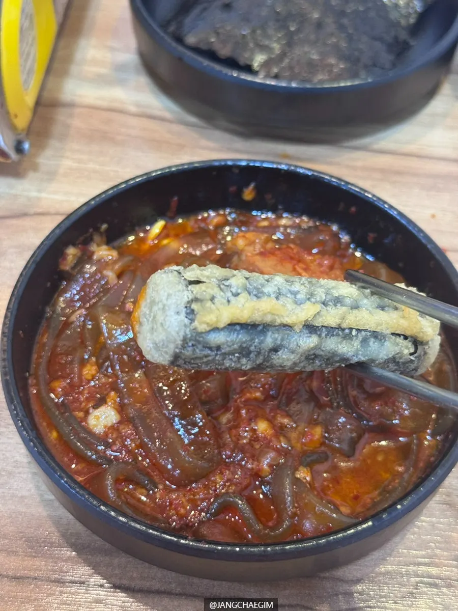 Galbijjim wrapped in seaweed and pickled perilla leaves