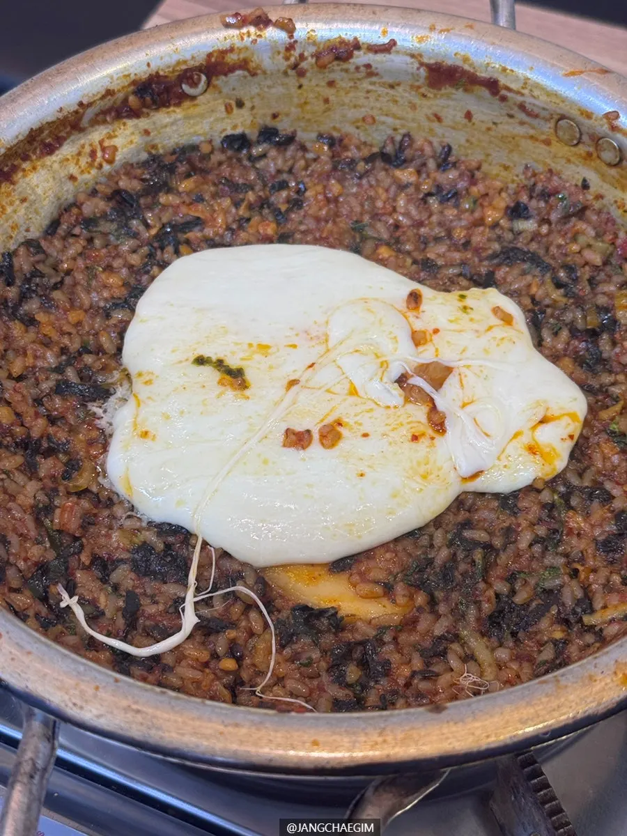 Crispy fritters dipped into galbijjim broth