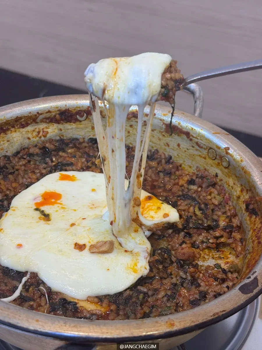 Spicy galbijjim fried rice topped with cheese