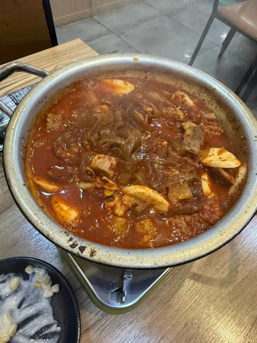 Pork spicy galbijjim boiling over the burner