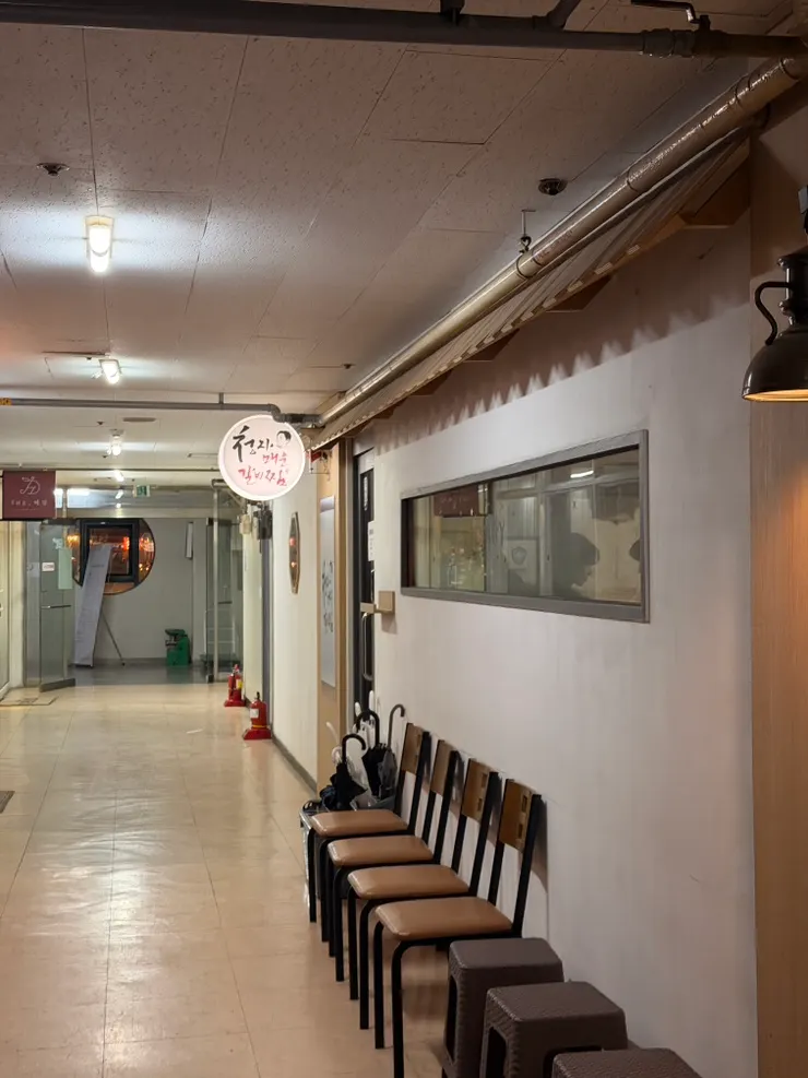 2nd floor store entrance with waiting chairs